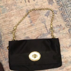 Coach purse that transitions to clutch